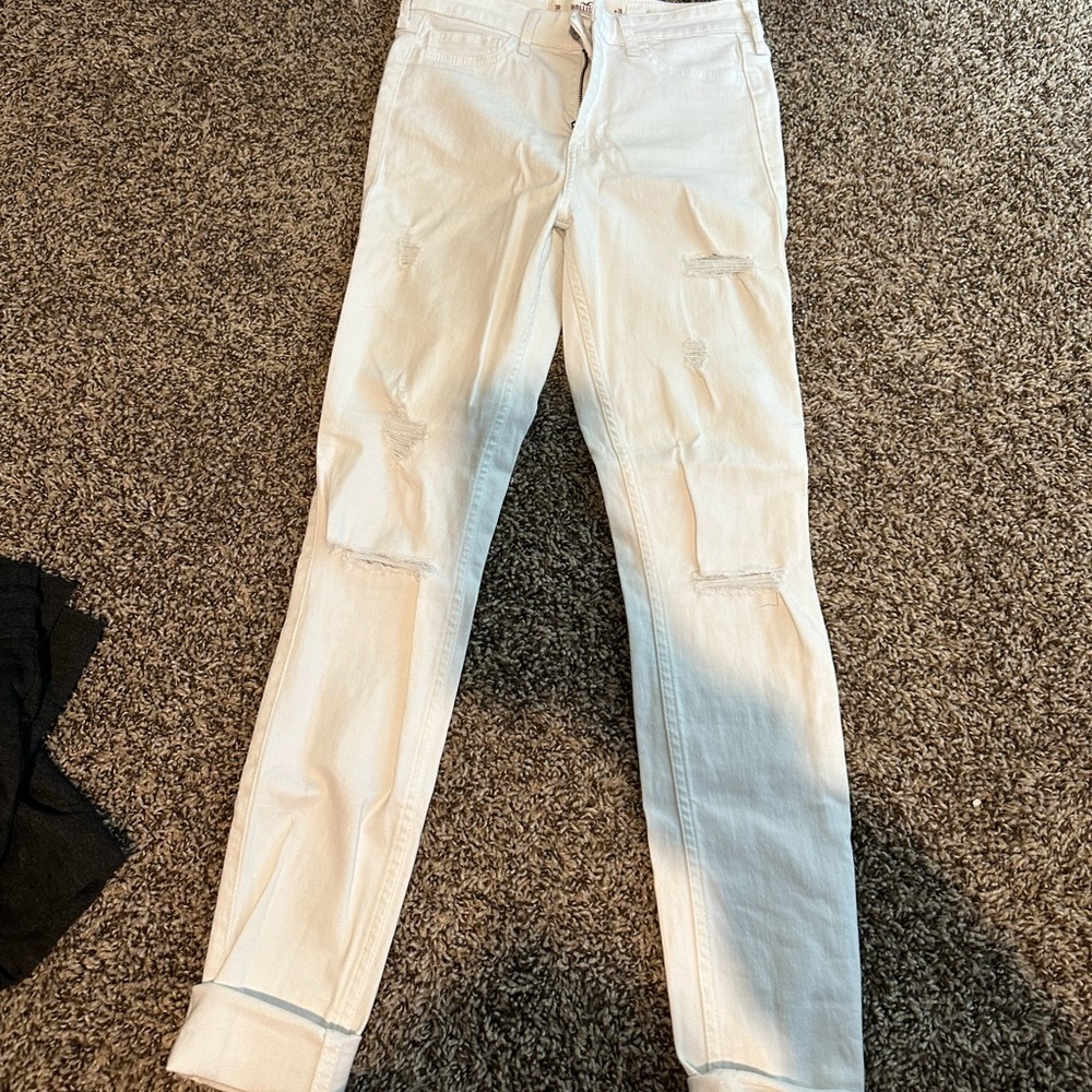 Women’s white ripped jeans